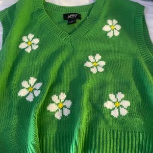 green sweater vest